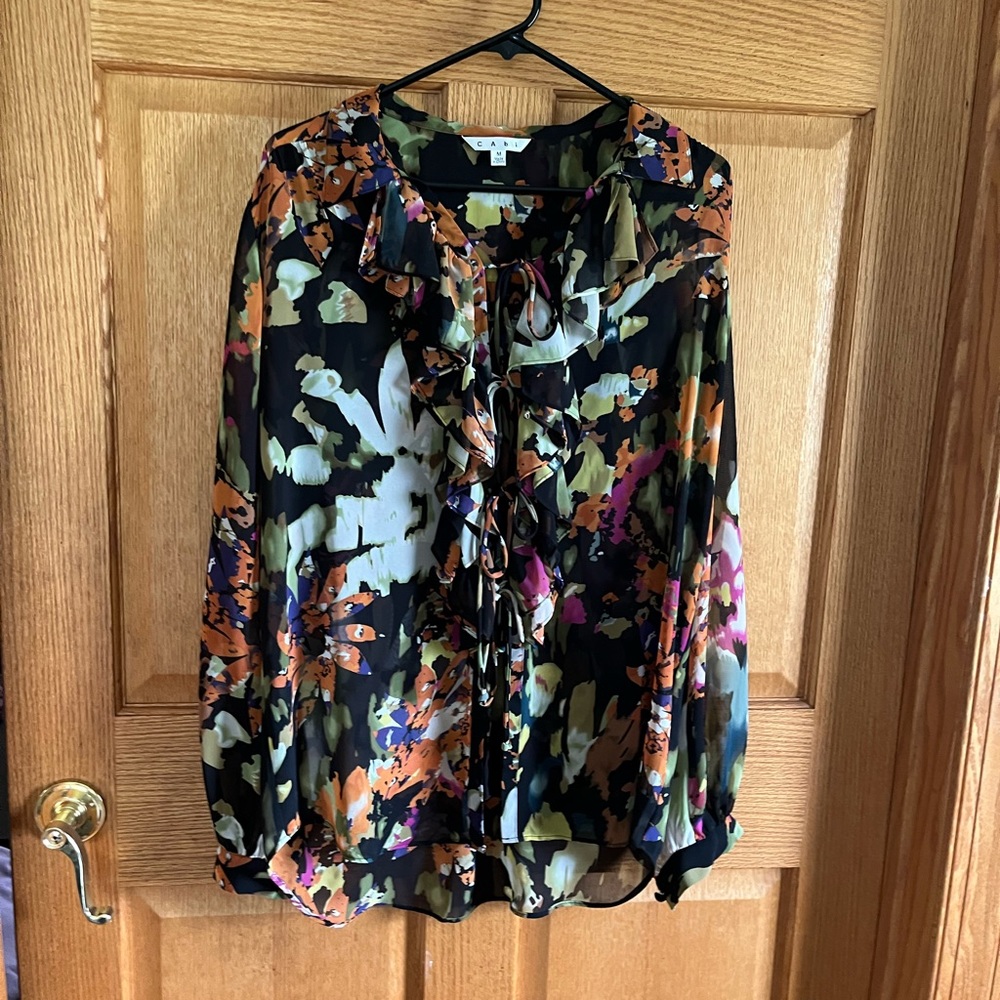 Cabi multi-colored outer top w/black base, full, long sleeves, buttoned cuffs.